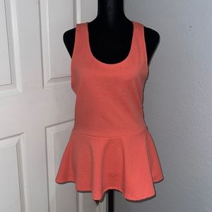 Coral peplum tank